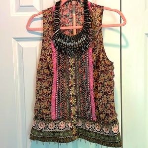 Beautiful beaded sleeveless top with open back